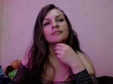 De Latijnse cam girl NaughtySlave tijdens een van haar webcamsex performances